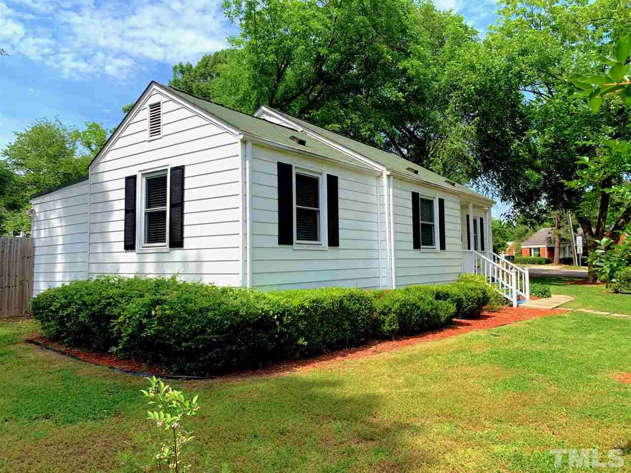 701 North King Charles Road Raleigh, NC 27610 - Photo 2 of 28 a view of a back yard of the house