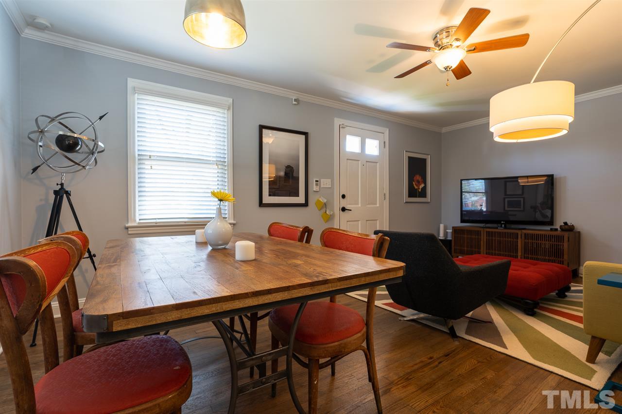701 North King Charles Road Raleigh, NC 27610 - Photo 11 of 28 a view of a dining room with furniture and a window