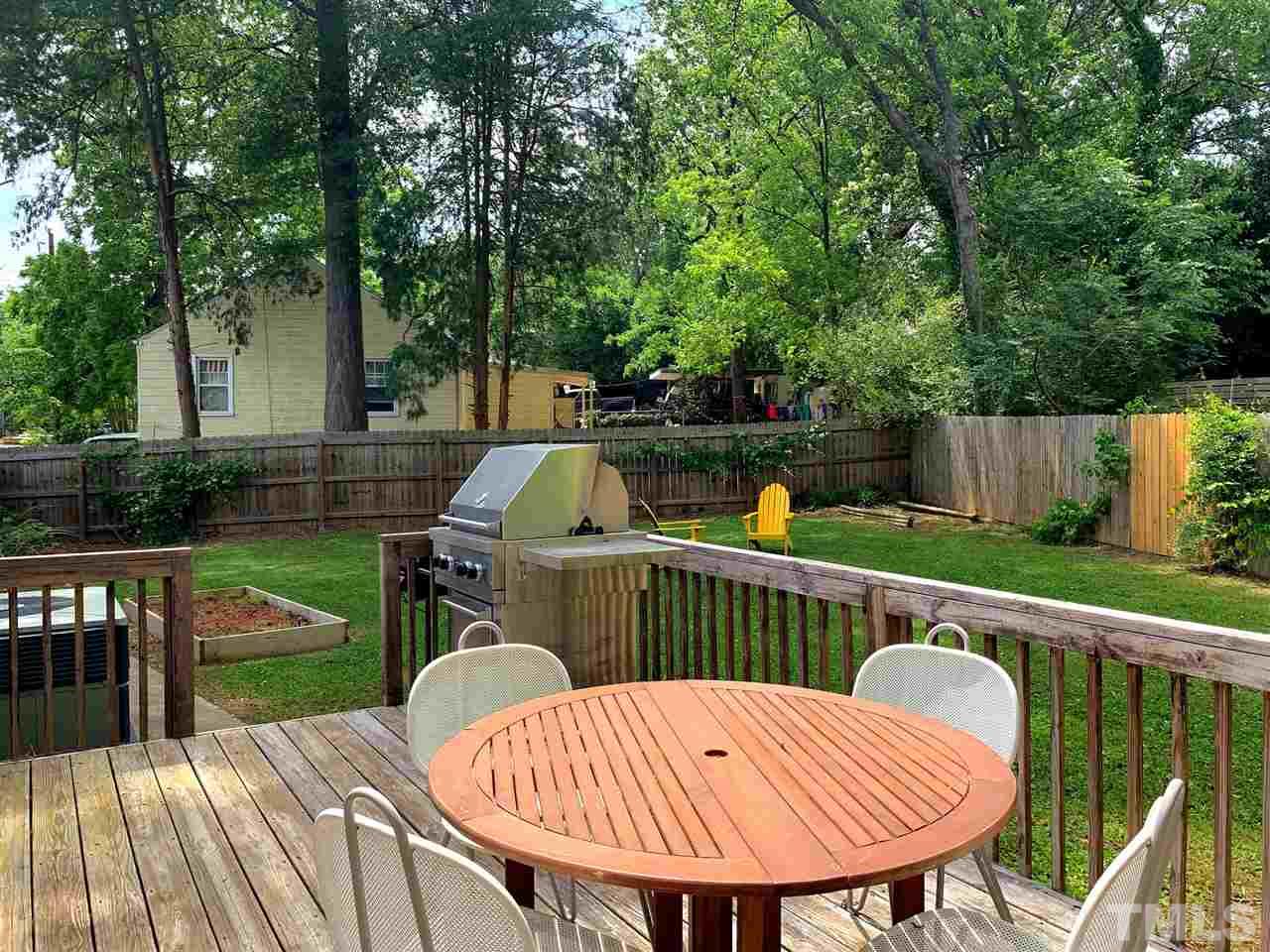 701 North King Charles Road Raleigh, NC 27610 - Photo 4 of 28 a view of balcony with furniture and garden