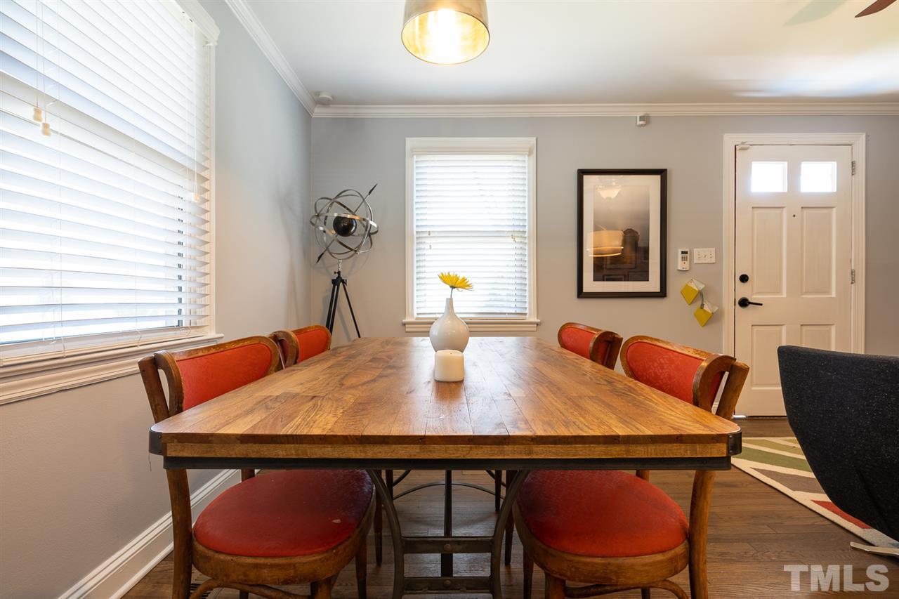 701 North King Charles Road Raleigh, NC 27610 - Photo 10 of 28 a view of a dining room with furniture and window