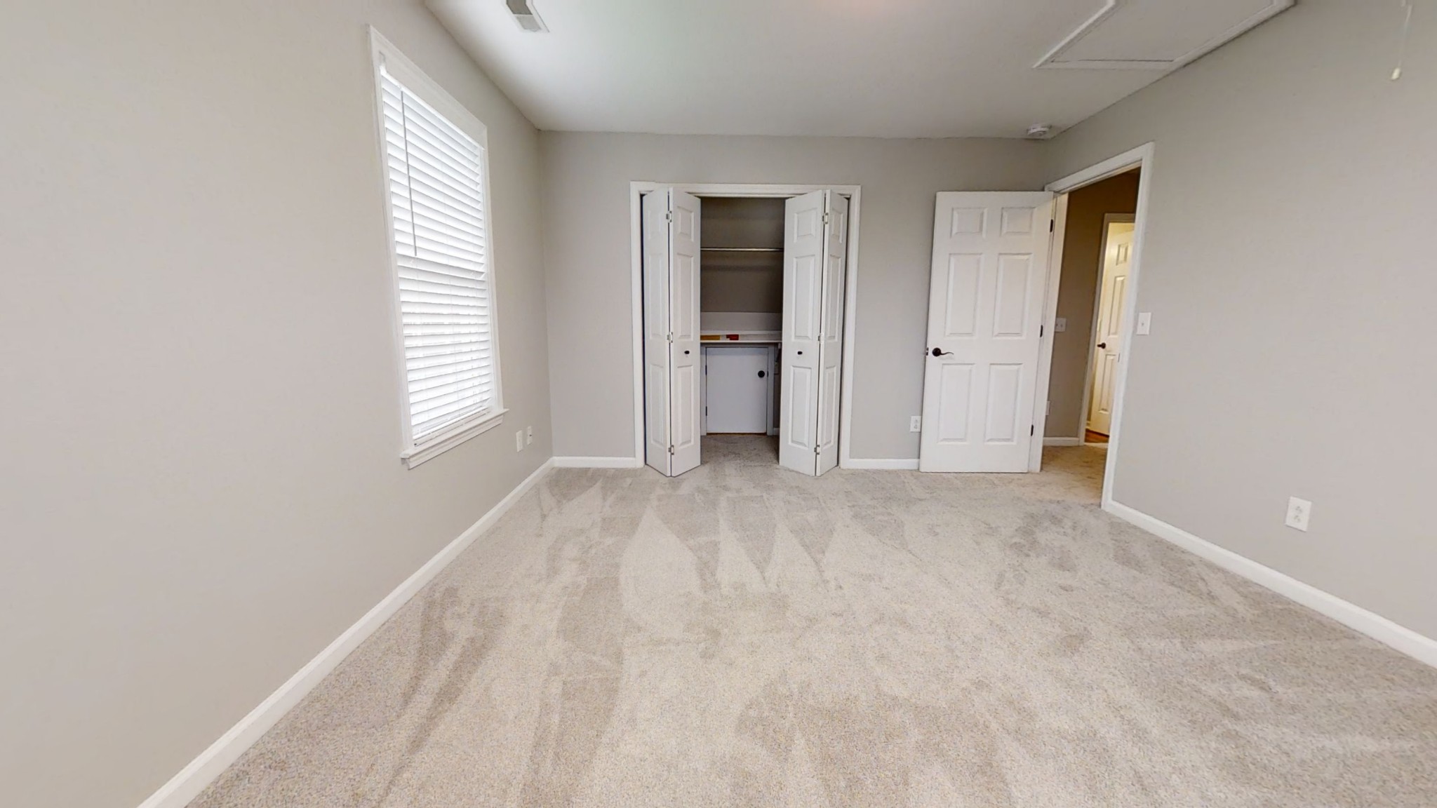 2805 Rippavilla Way Spring Hill, TN 37174 - Photo 26 of 30 a view of an empty room with wooden floor and a window
