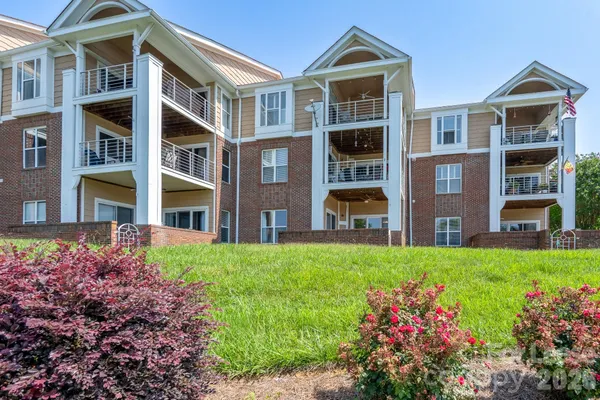 a view of a big yard in front of a building