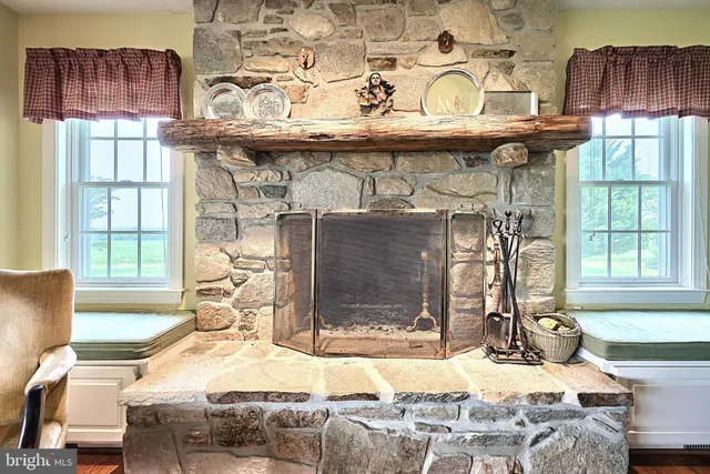 a view of a kitchen with a stove and a clock