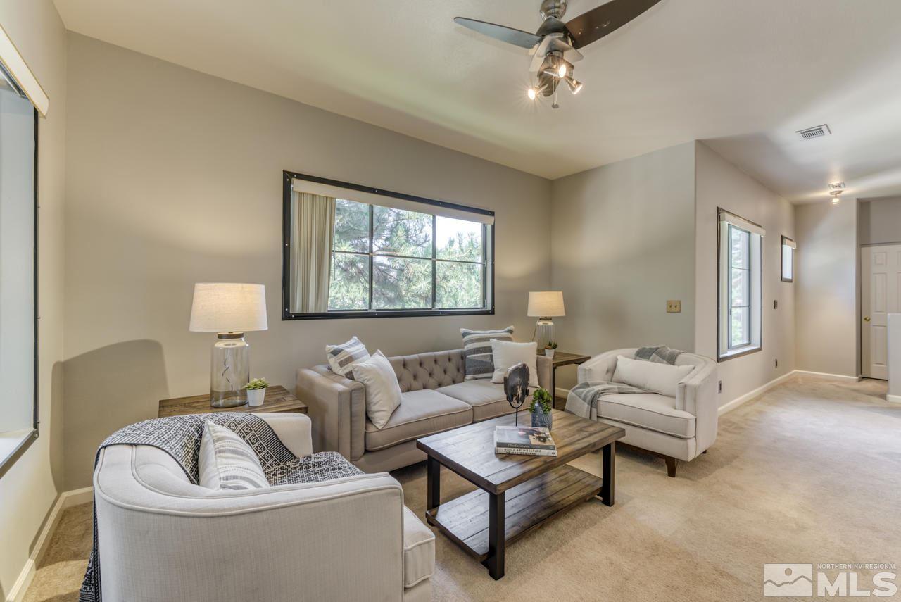 900 S, Unit 2024 Reno, NV 89521 - Photo 11 of 32 a living room with furniture and a window