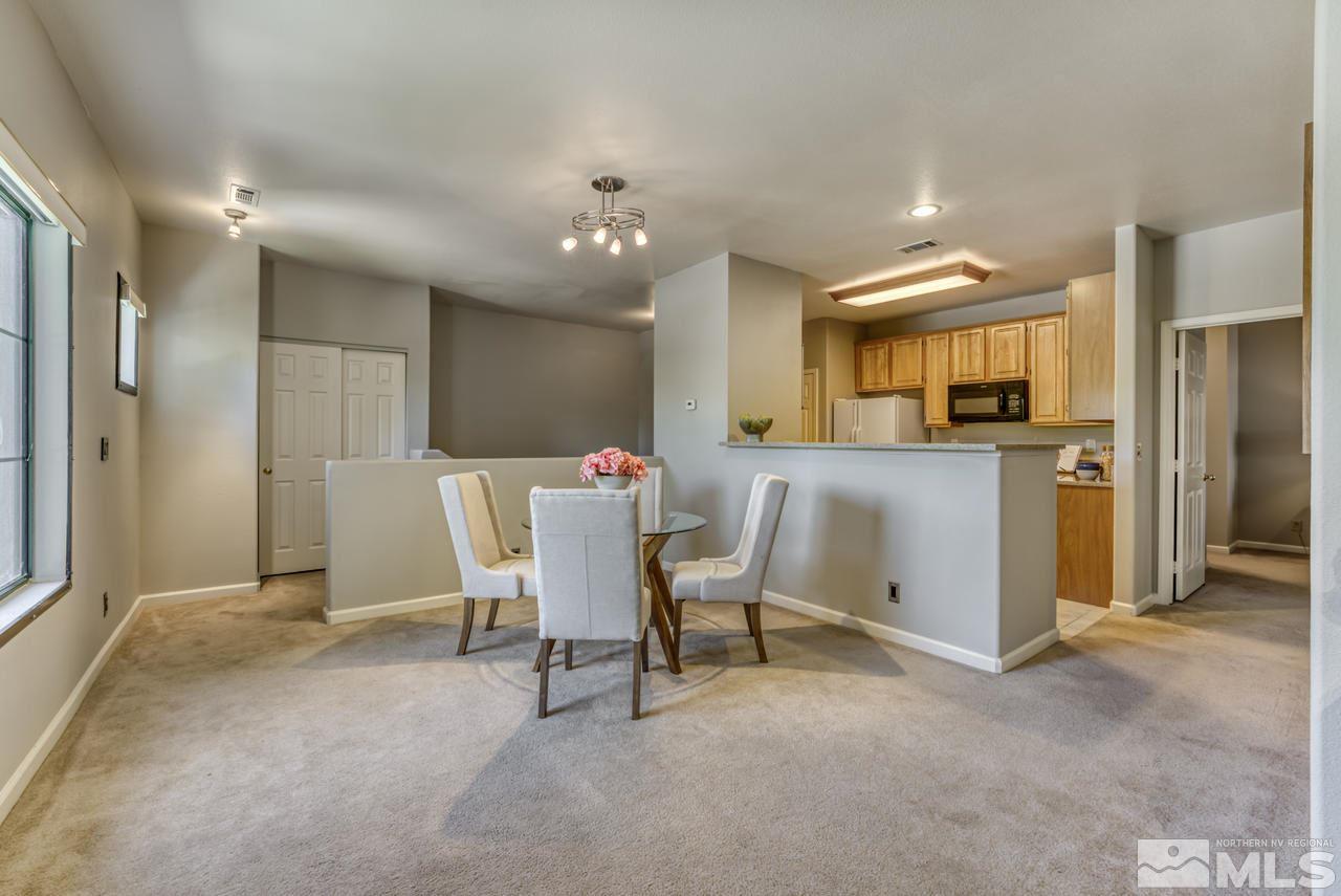 900 S, Unit 2024 Reno, NV 89521 - Photo 12 of 32 a view of a dining room with furniture
