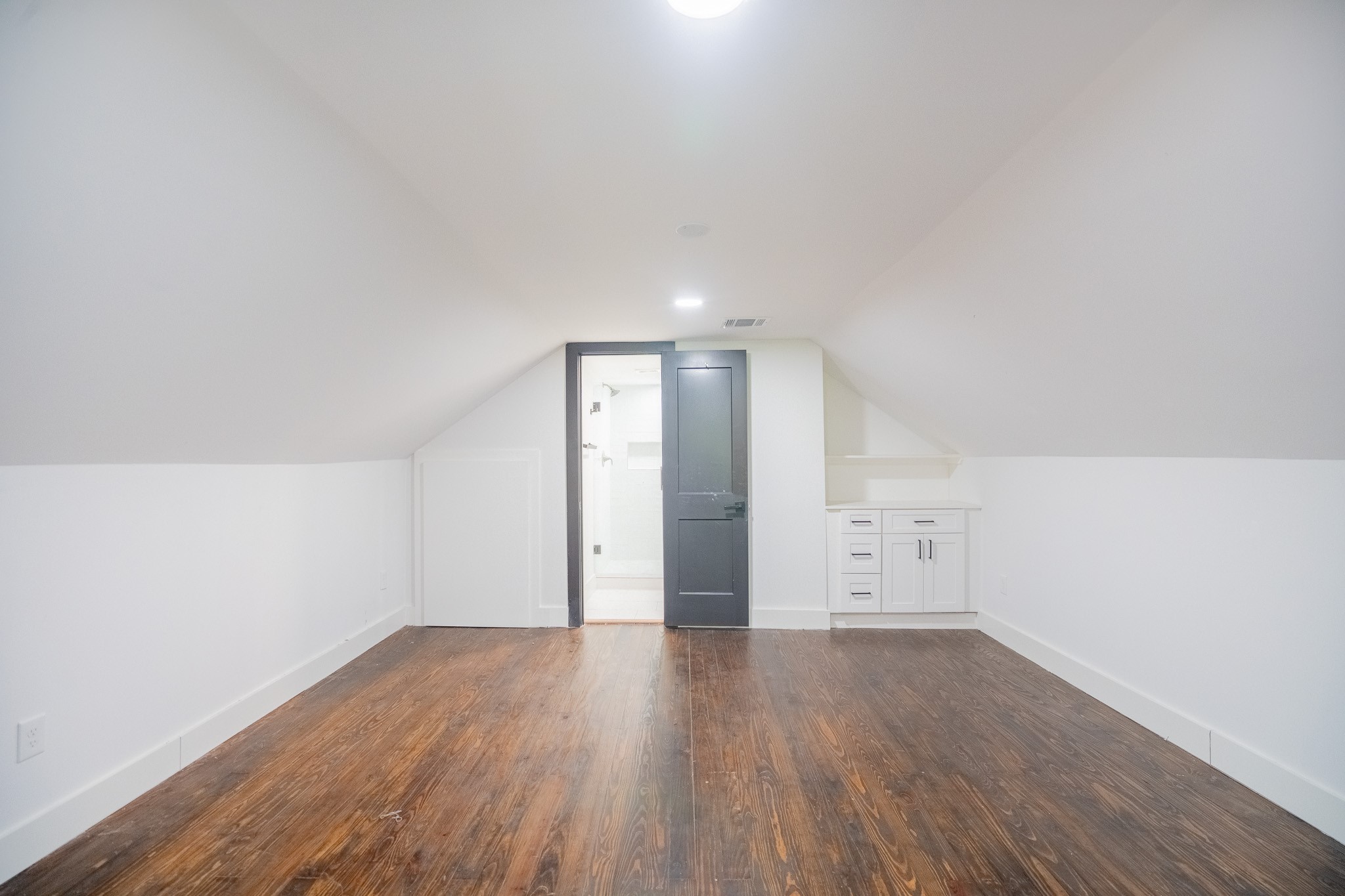 7305 Capitol Street Houston, TX 77011 - Photo 15 of 16 a view of an empty room with wooden floor