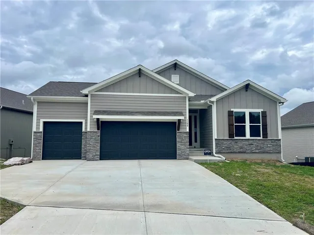 $615,000 | 1128 Southwest Whitby Drive, Lee's Summit, MO 64083