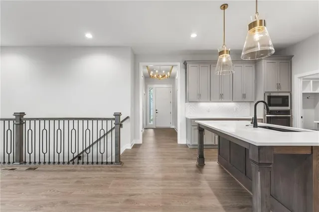 $590,000 | 1128 Southwest Whitby Drive, Lee's Summit, MO 64083