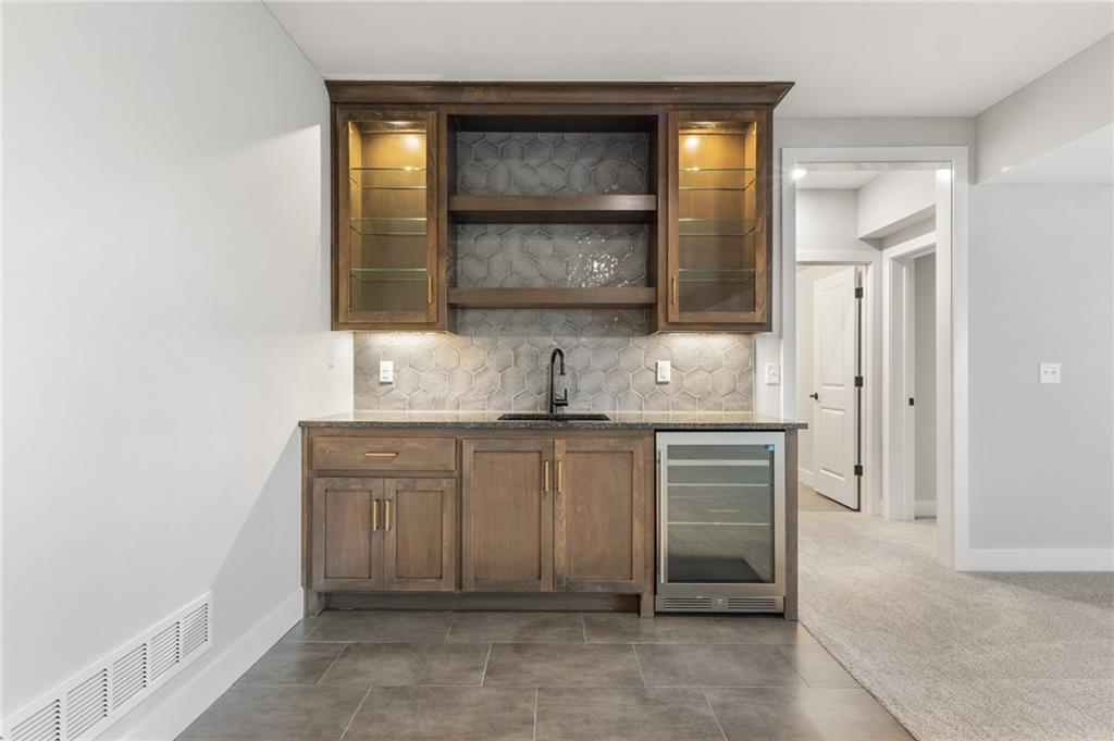 1128 Southwest Whitby Drive Lee's Summit, MO 64083 - Photo 22 of 32