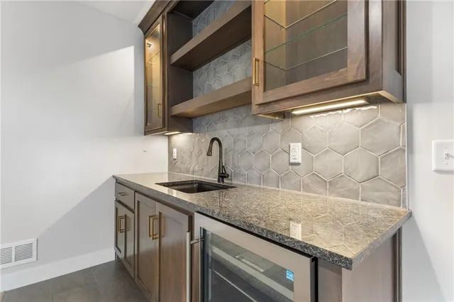 $590,000 | 1128 Southwest Whitby Drive, Lee's Summit, MO 64083