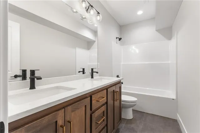 $590,000 | 1128 Southwest Whitby Drive, Lee's Summit, MO 64083