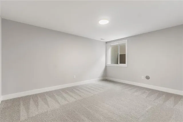 $590,000 | 1128 Southwest Whitby Drive, Lee's Summit, MO 64083