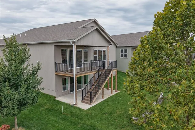 $590,000 | 1128 Southwest Whitby Drive, Lee's Summit, MO 64083