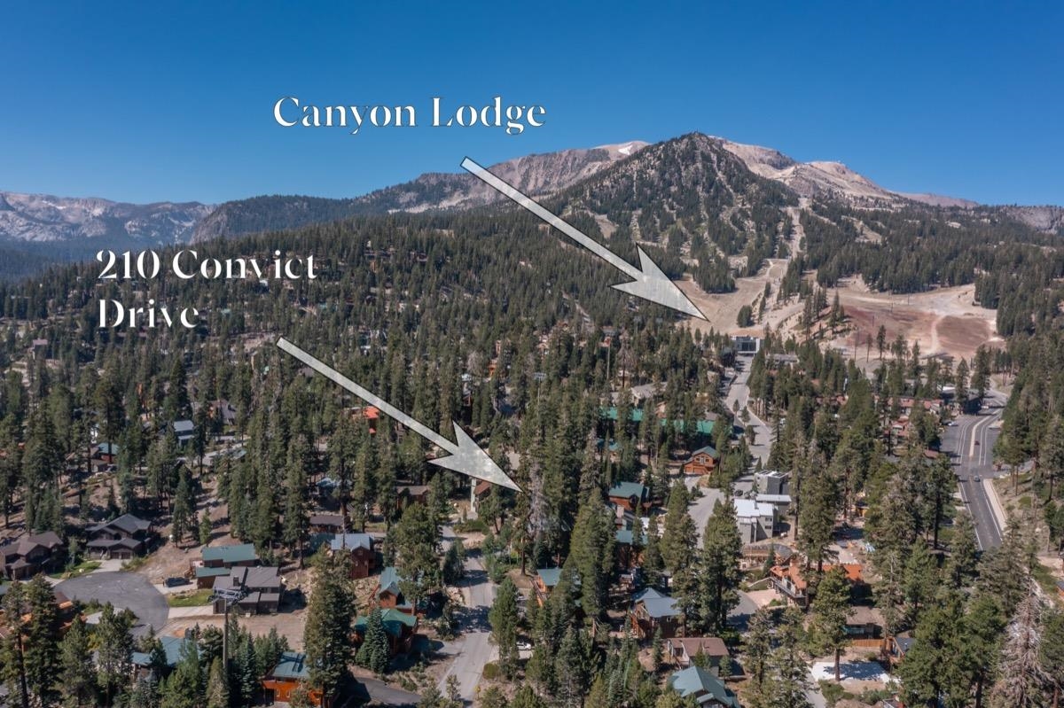 210 Convict Drive Mammoth Lakes, CA 93546 - Photo 3 of 46 a view of a house with a mountain