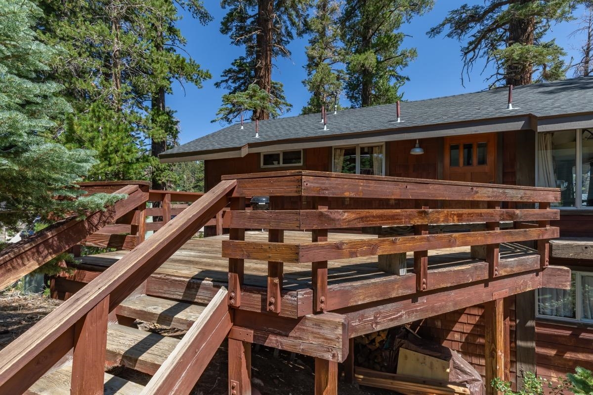 210 Convict Drive Mammoth Lakes, CA 93546 - Photo 34 of 46 a front view of a house with balcony and outdoor space