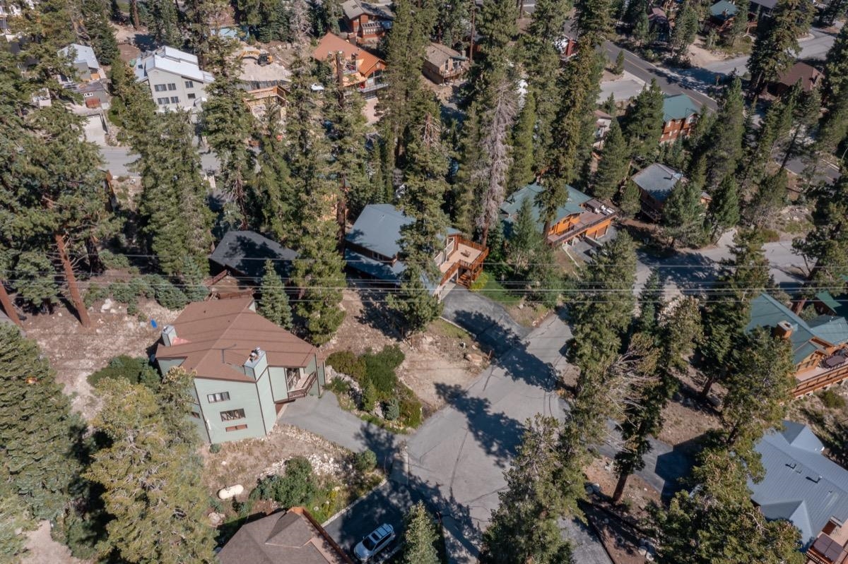 210 Convict Drive Mammoth Lakes, CA 93546 - Photo 41 of 46 an aerial view of house with yard and mountain view in back