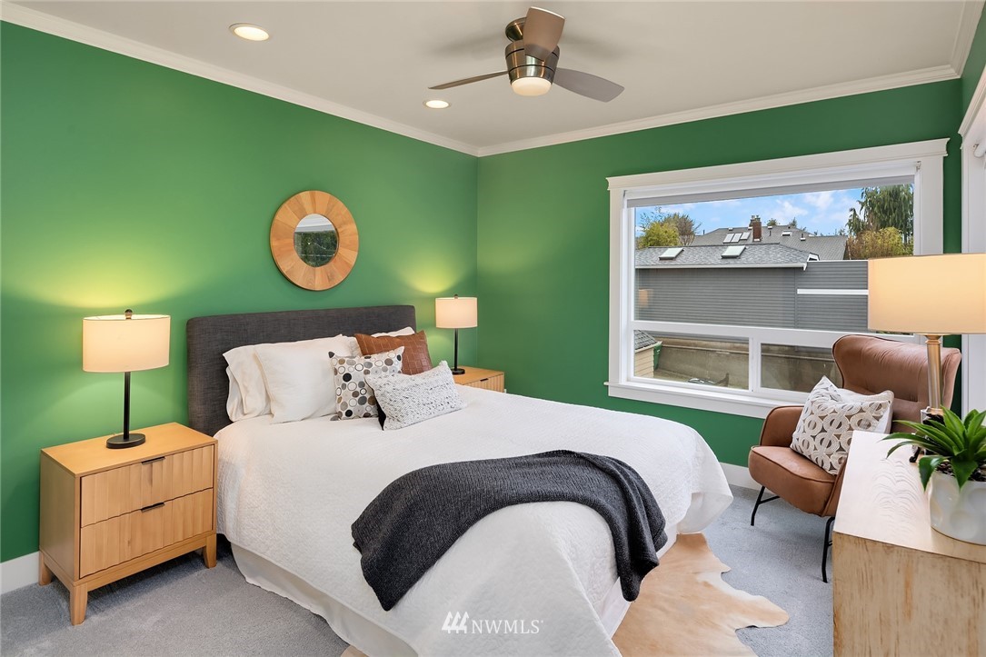 912 North 68th Street Seattle, WA 98103 - Photo 24 of 38 a bedroom with a bed and window