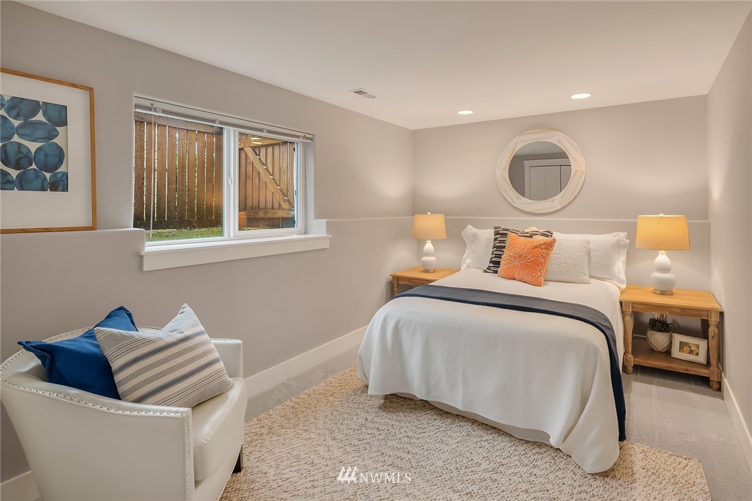 912 North 68th Street Seattle, WA 98103 - Photo 29 of 38 a bedroom with bed and a couch