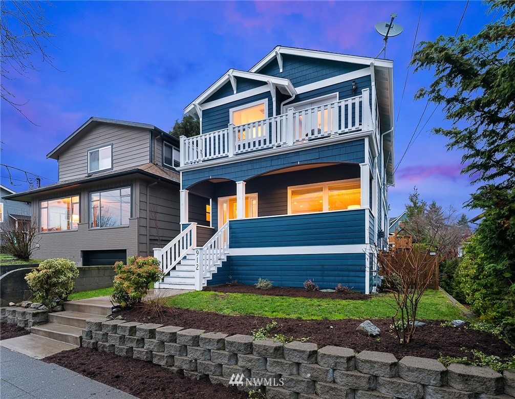 912 North 68th Street Seattle, WA 98103 - Photo 36 of 38 a front view of a house with a yard