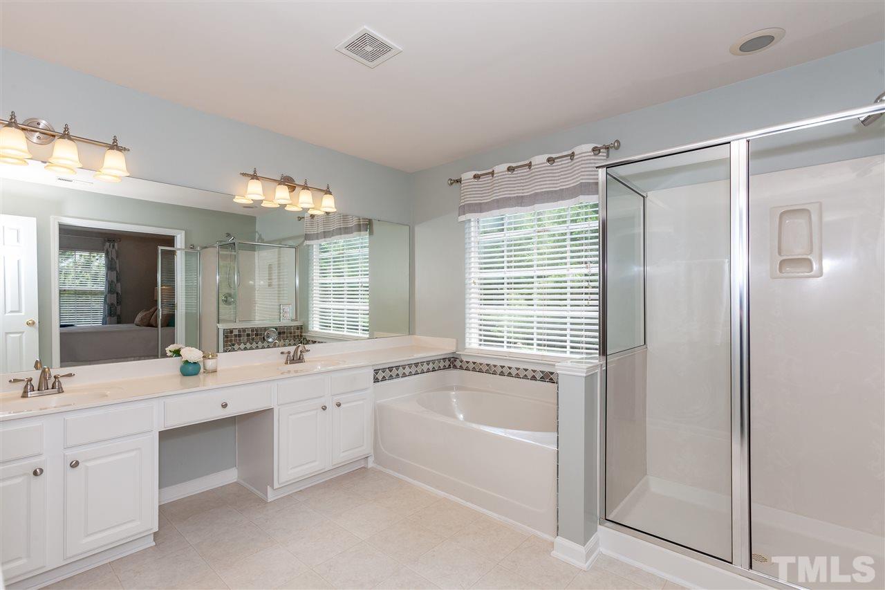 7331 Brandon Allen Avenue Raleigh, NC 27613 - Photo 12 of 25 HUGE master bath with extra-long double vanity, garden tub, and shower.