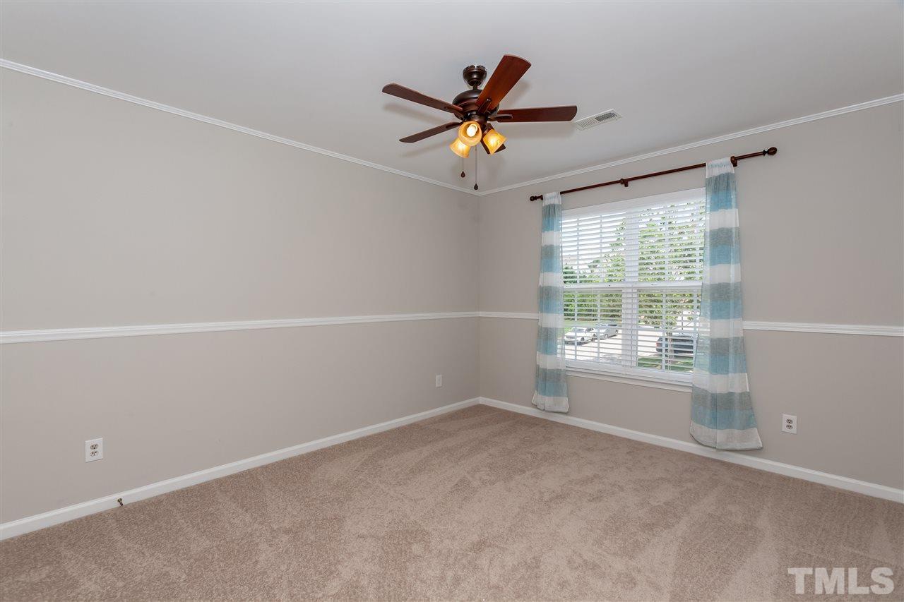 7331 Brandon Allen Avenue Raleigh, NC 27613 - Photo 14 of 25 This bedroom has its own door to the upstairs hall bath.