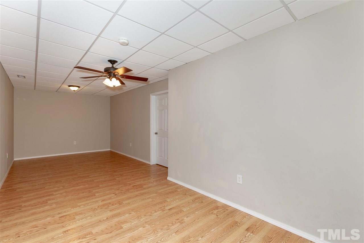 7331 Brandon Allen Avenue Raleigh, NC 27613 - Photo 18 of 25 This huge flex space would be an ideal media or game area!