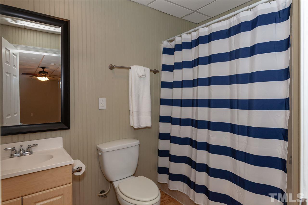 7331 Brandon Allen Avenue Raleigh, NC 27613 - Photo 20 of 25 The finished basement has its own full bath.