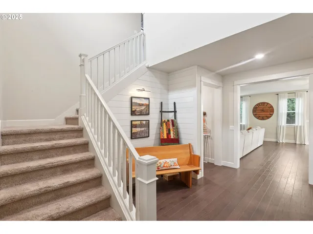 a view of entryway with stairs and furniture