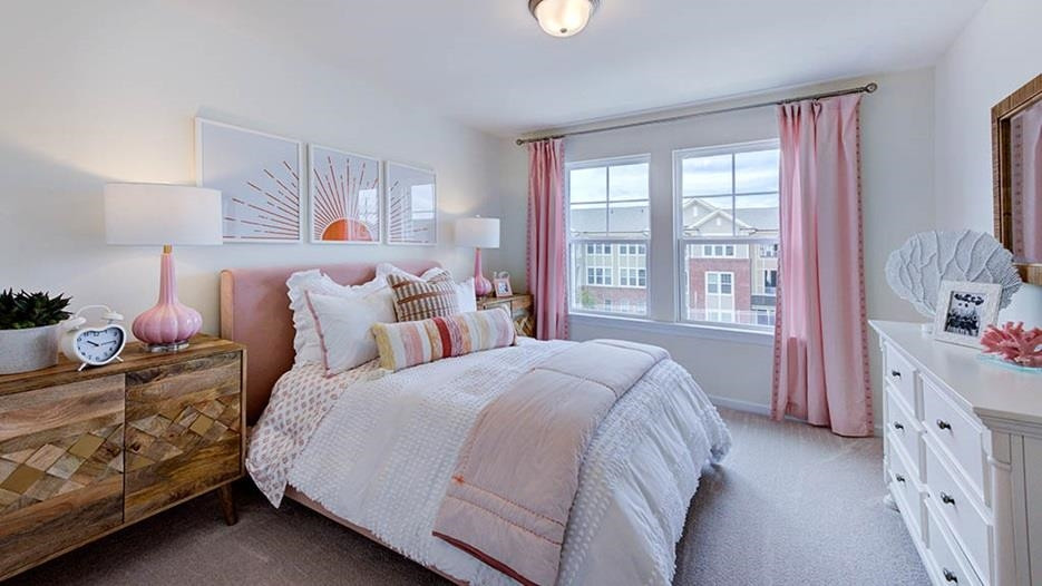 941 Baldwin Rdg Road Apex, NC 27523 - Photo 19 of 21 a bedroom with two beds and a window