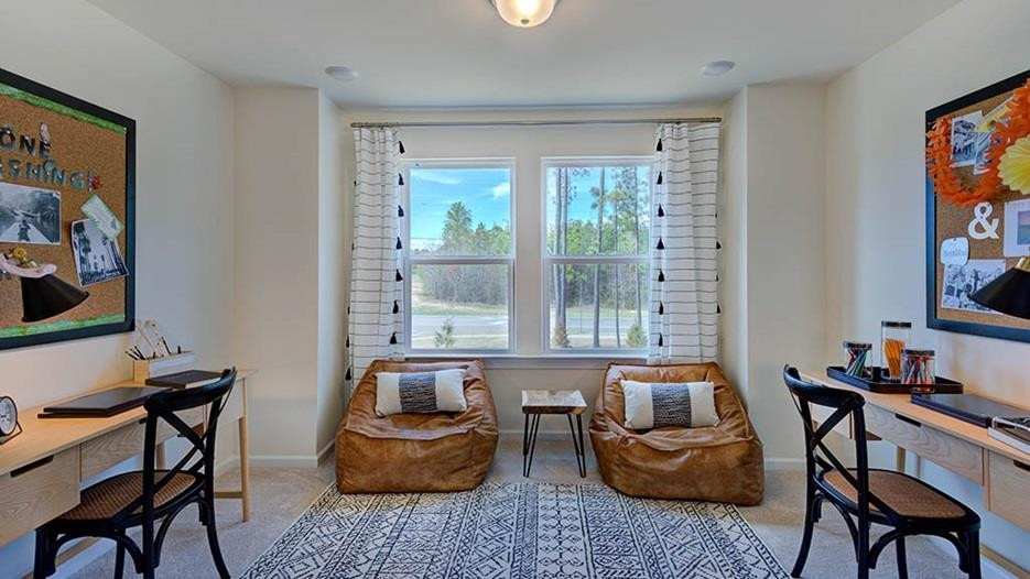 941 Baldwin Rdg Road Apex, NC 27523 - Photo 20 of 21 a living room with furniture and a window