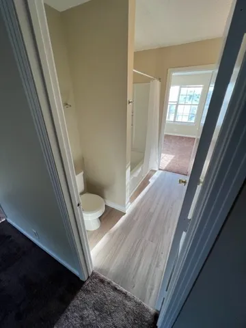a bathroom with a sink and toilet