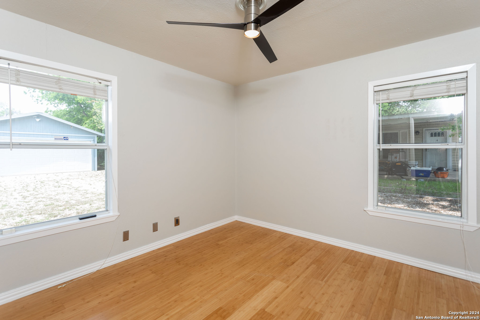 229 Weathercock Lane Windcrest, TX 78239 - Photo 8 of 12 a view of empty room with window