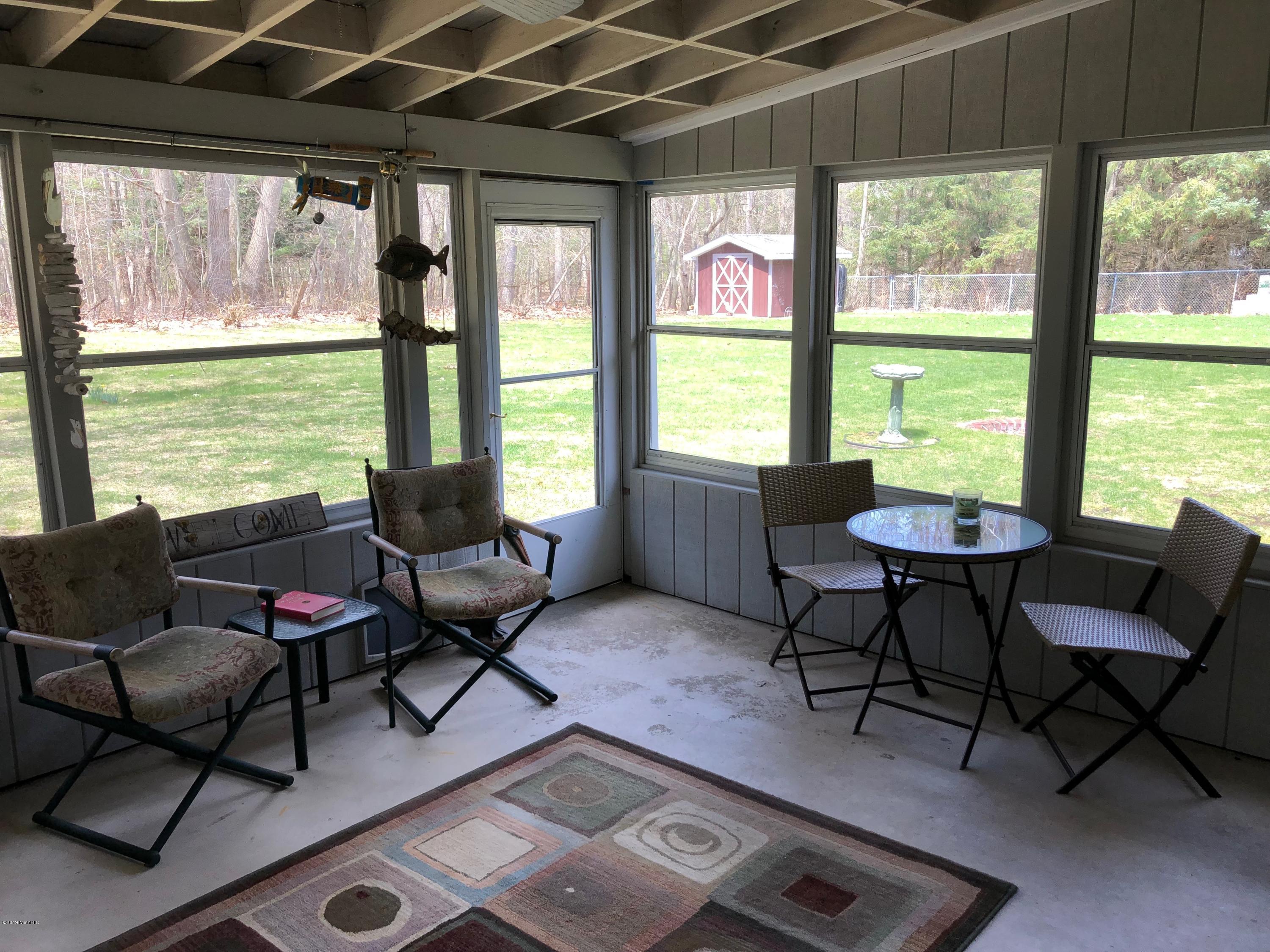 1988 Guthrie Road Manistee, MI 49660 - Photo 30 of 35 Back Patio Room overlooks Back Yard