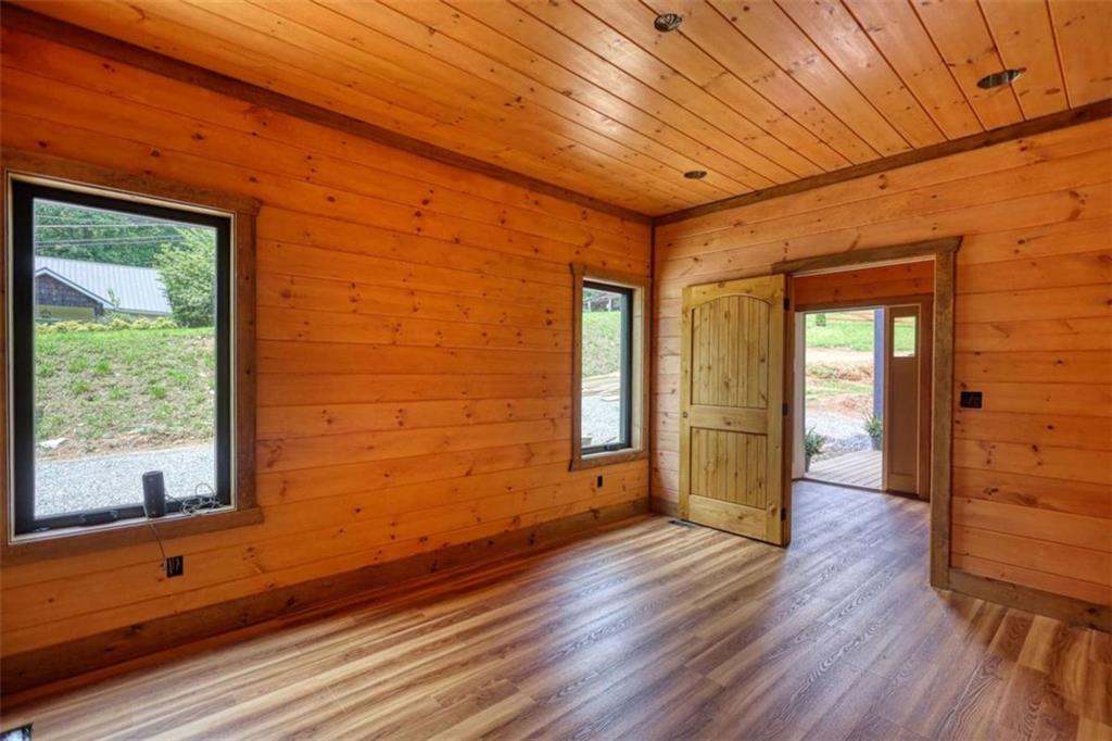 485 Church Street Blue Ridge, GA 30513 - Photo 18 of 85 a view of a room with wooden floor and large window