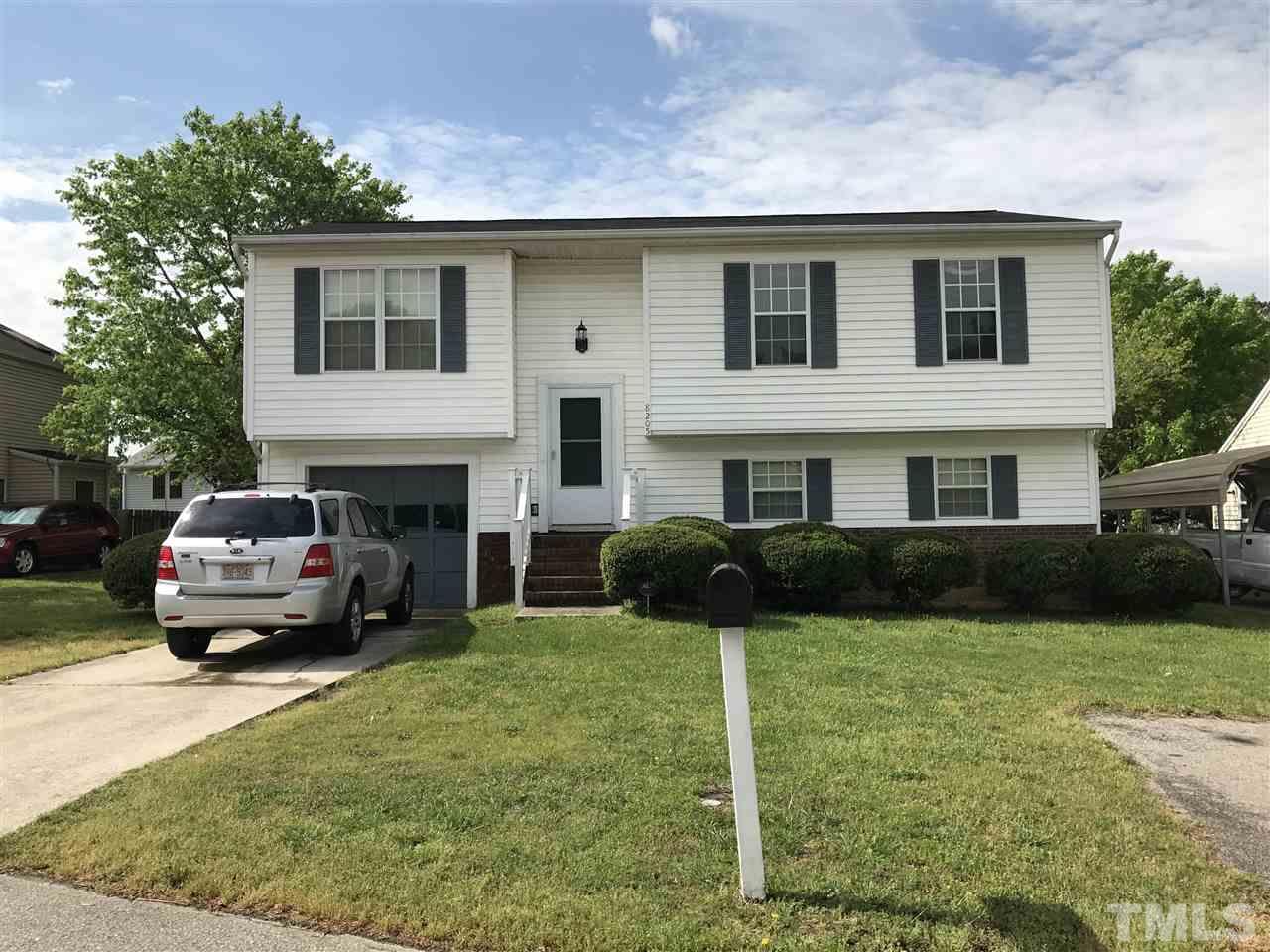 8205 Wynewood Drive Raleigh, NC 27616 - Photo 1 of 24 a house view with a garden space