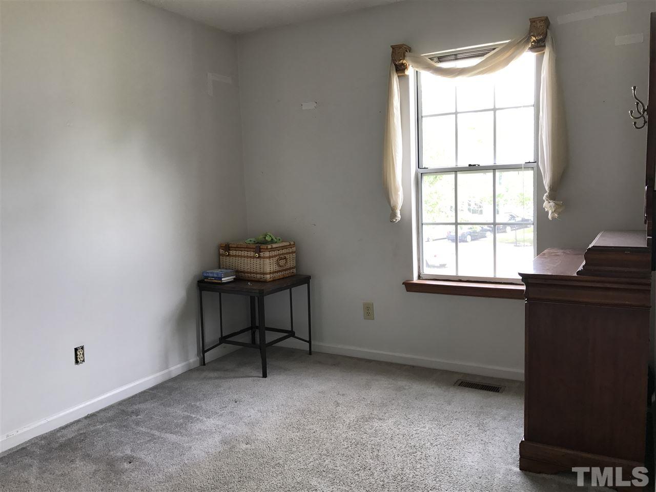 8205 Wynewood Drive Raleigh, NC 27616 - Photo 14 of 24 a workspace with a window
