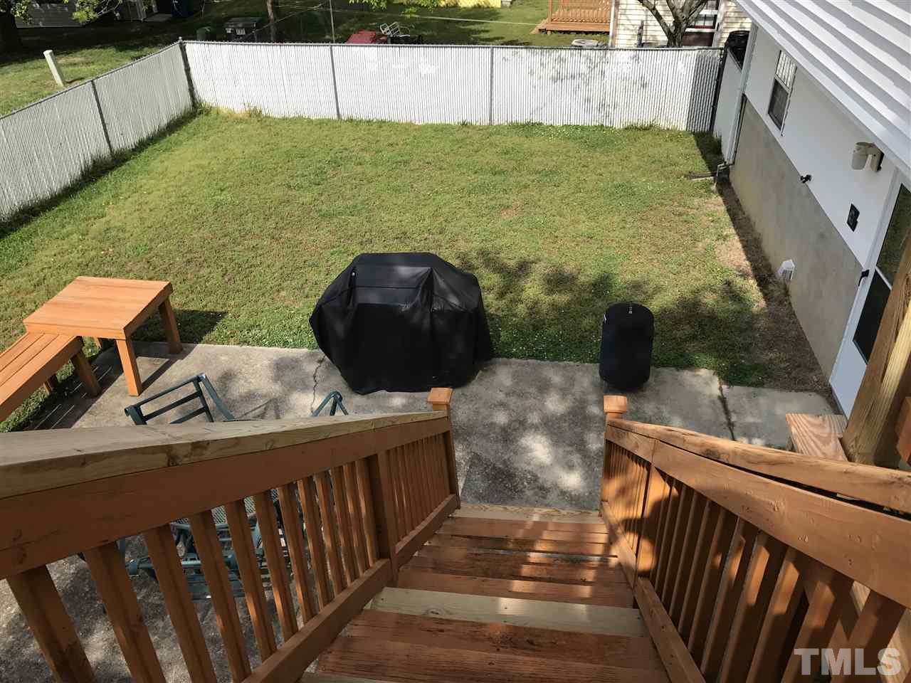 8205 Wynewood Drive Raleigh, NC 27616 - Photo 22 of 24 a balcony with table and chairs