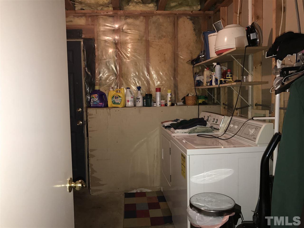 8205 Wynewood Drive Raleigh, NC 27616 - Photo 23 of 24 a utility room with dryer and washer