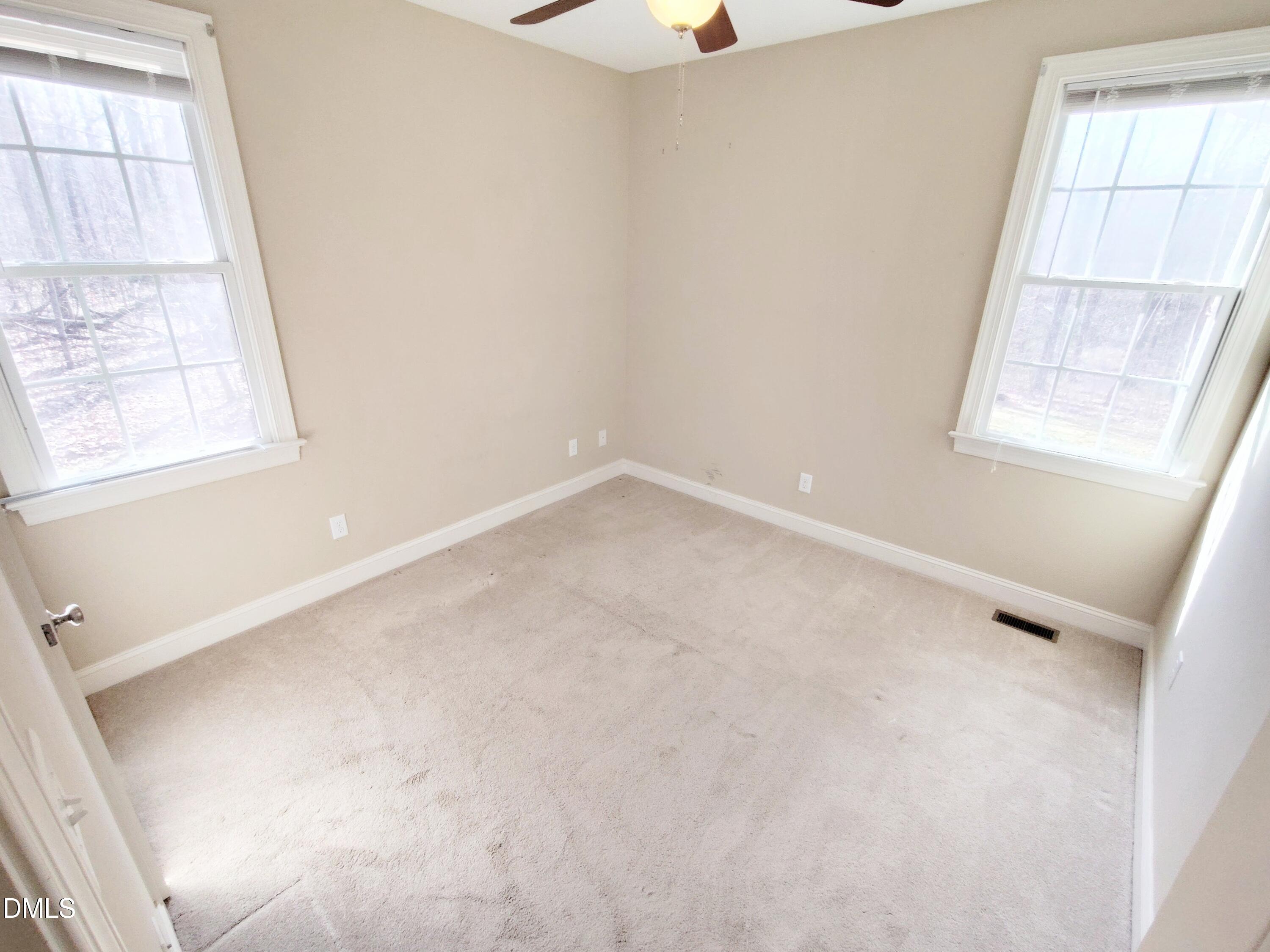 279 Weaver Ridge Road Rougemont, NC 27572 - Photo 19 of 25 an empty room with a window