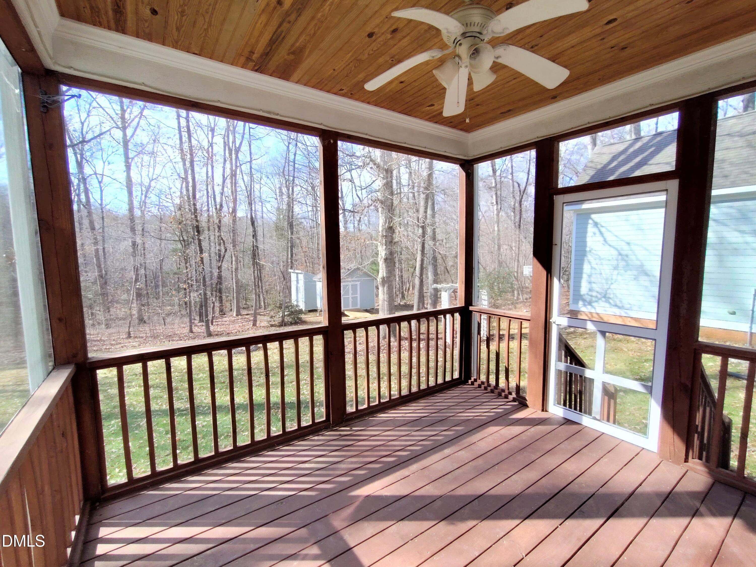 279 Weaver Ridge Road Rougemont, NC 27572 - Photo 22 of 25 a view of a porch with wooden floor
