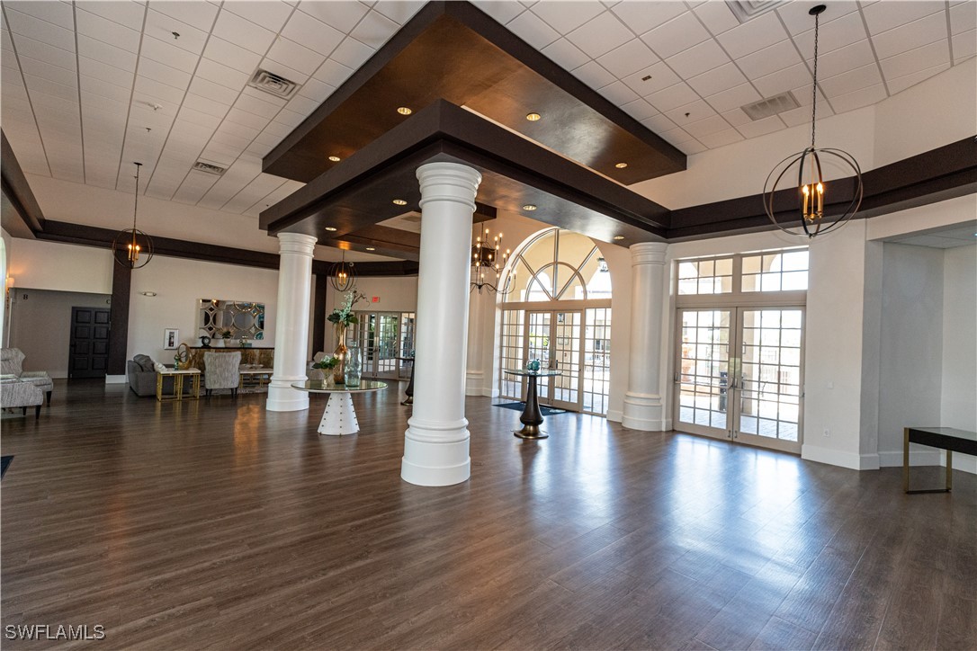 2170 Faliron Road North Fort Myers, FL 33917 - Photo 23 of 30 a view of an empty room with window and wooden floor