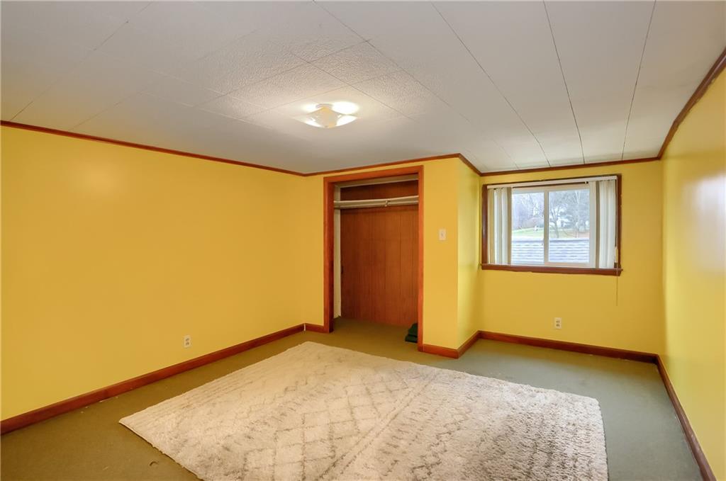 3564 Ellwood Road New Castle, PA 16101 - Photo 20 of 34 a view of an empty room with a window