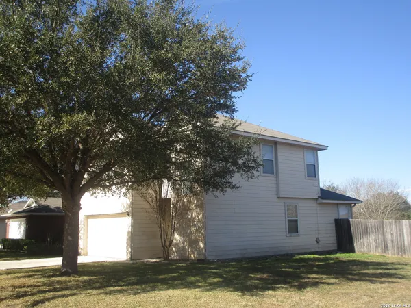 a view of a house with a swimming pool