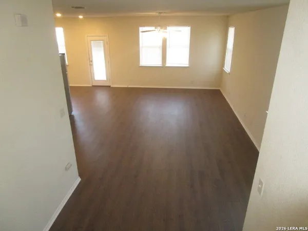 an empty room with windows