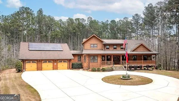 an aerial view of residential house with outdoor space
