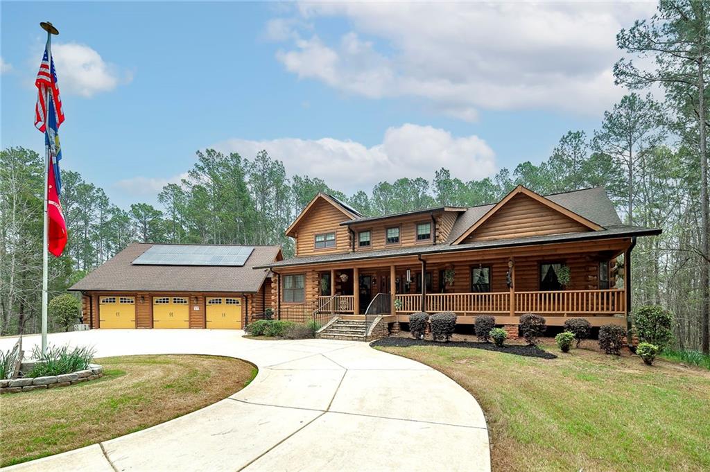 570 Eskew Road McDonough, GA 30252 - Photo 11 of 89 a front view of a house with yard patio and fire pit