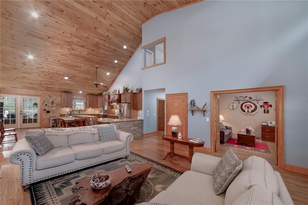 570 Eskew Road McDonough, GA 30252 - Photo 17 of 89 a living room with furniture and a view of kitchen