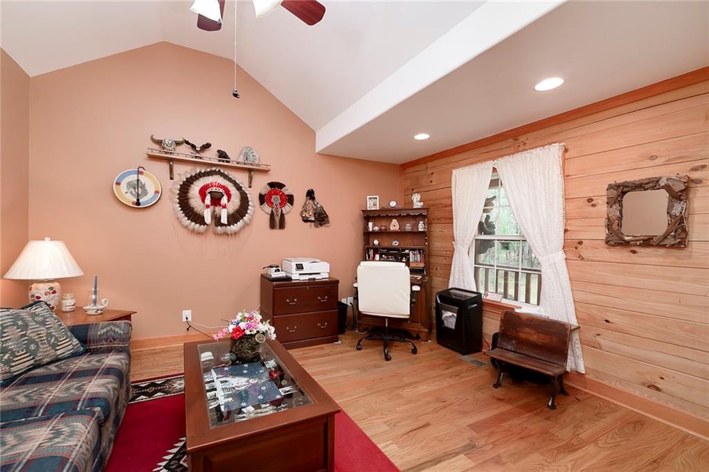 570 Eskew Road McDonough, GA 30252 - Photo 29 of 89 a living room with furniture and a table