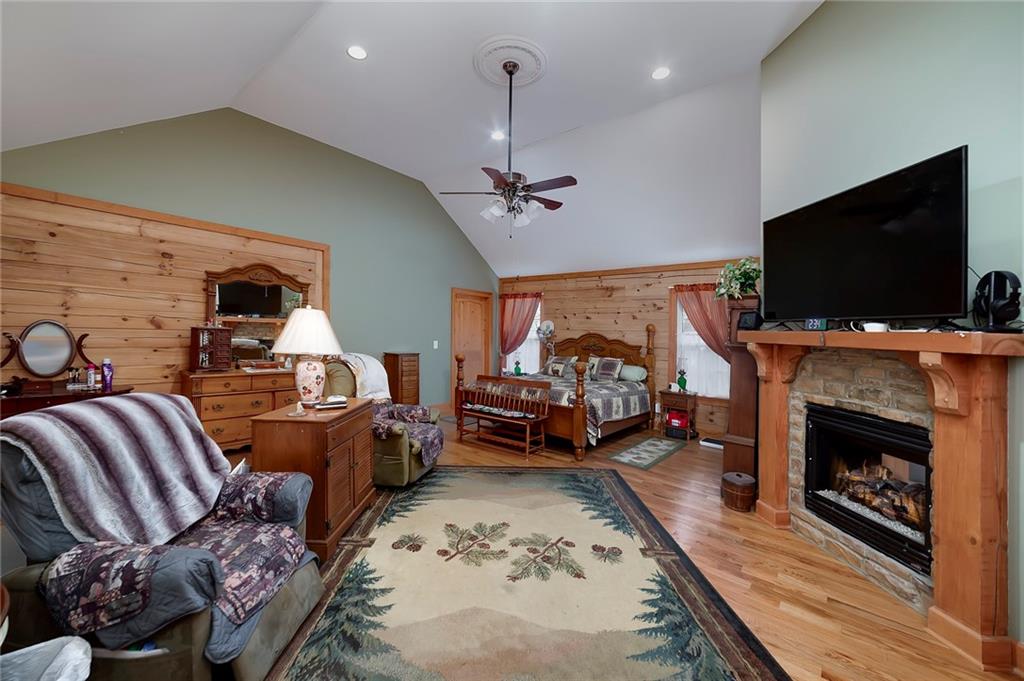 570 Eskew Road McDonough, GA 30252 - Photo 36 of 89 a living room with furniture and a flat screen tv