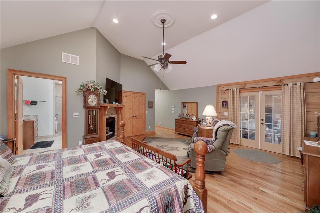 570 Eskew Road McDonough, GA 30252 - Photo 43 of 89 a living room with furniture a ceiling fan and a rug